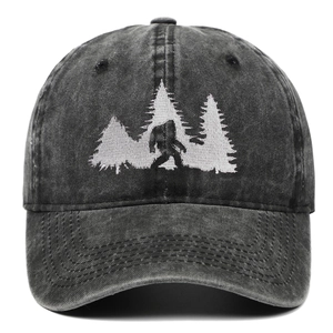 Distressed dark grey Bigfoot embroidered baseball cap with pine trees and vintage wash