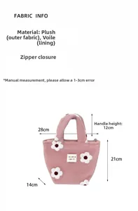 Detailed view of pink plush handbag with white flowers and smooth zipper closure