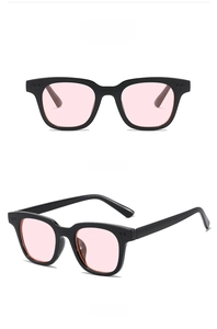 Detail view showing black frame with pink lenses sunglasses from front and side angles