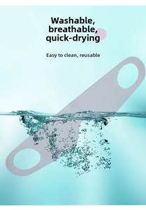Washable and breathable grey fabric face mask shown with splashing water effect