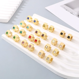 Minimalist gold stainless steel huggie earrings set with colorful rectangular zircons
