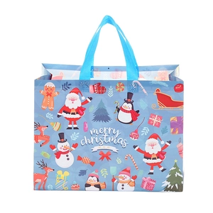Blue Christmas non-woven gift bag with snowman and reindeer print for holiday parties