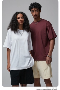 Relaxed fit oversized cotton t-shirts shown in white and burgundy on male and female models