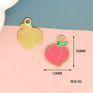 Detailed macro view showing a peach charm size 16x12mm with pink enamel and gold plating