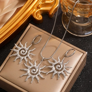 Silver stainless steel textured sun pendant necklace and hoop earring jewelry set