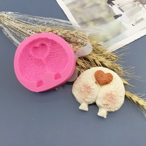 Pink silicone corgi butt and heart shaped mold for DIY chocolate and pet snacks