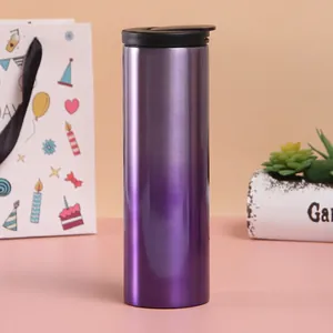 Detail of purple gradient stainless steel travel mug with black lid in gift setting