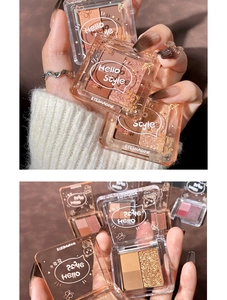 Macro view of matte and shimmer earth tone eyeshadow powders in clear acrylic cases