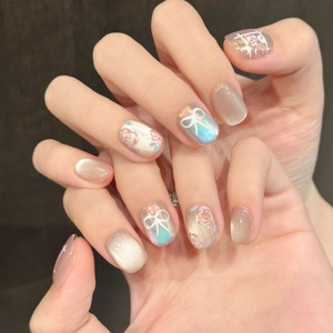 Handmade aurora cat-eye press-on nails with hand-painted rose and bowknot design