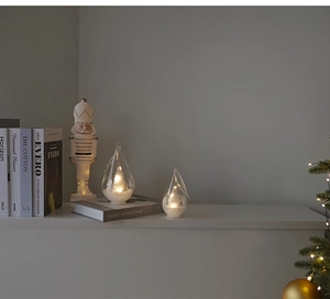 Glow-in-the-dark teardrop glass Christmas tree with LED lights and miniature snow scene