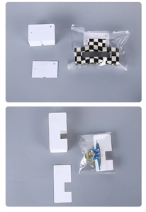 Close-up of hair claw clips with checkered patterns on white card in clear packaging