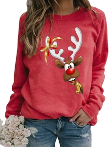 Detail of red Christmas sweatshirt showing cartoon reindeer print and gold bell ornament