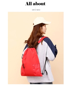 Roter Kordelzug Rucksack aus Oxford-Gewebe, lässiger Sportbeutel mit Reißverschlusstasche.