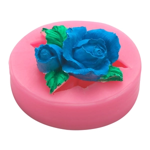 Pink silicone mold for 3D rose flower fondant cake decoration with green leaf detail