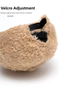 Detail of adjustable Velcro strap on warm faux lamb wool baseball cap for a perfect fit