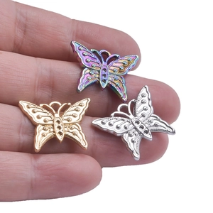 Three minimalist butterfly stainless steel charms in gold, silver, and rainbow colors
