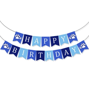Blue Happy Birthday banner for dog parties featuring paw print accents on two rows