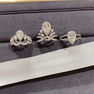 Three-piece 18K white gold plated pear-shaped diamond ring set with crown style micro-pave
