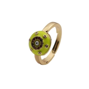 Detail of neon green enamel evil eye ring with gold band and sparkling zircon stones