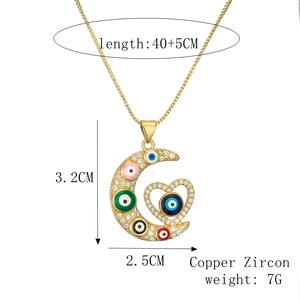 Collier lune et cœur doré avec breloques œil maléfique colorées en cuivre et zircon