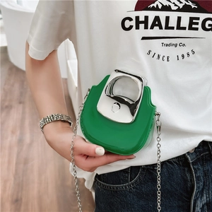 Mini green patent leather shoulder bag with silver metal handle and chain strap for women