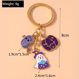 Detail showing dimensions of Halloween keychain with enamel ghost and pumpkin charms