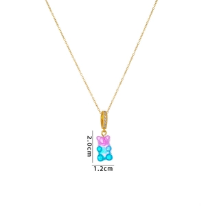 Detail view of gradient resin bear pendant with 2.0cm height and 1.2cm width dimensions