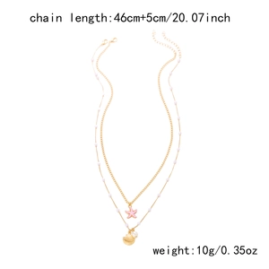 Detail of layered starfish and shell necklace with pearls showing 46cm chain length