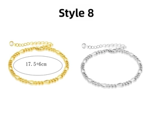 Detail of gold and silver Figaro chain bracelets with lobster clasp and adjustable 17.5+6cm link
