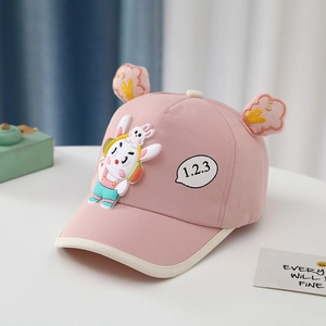 Detail of pink cotton baby baseball cap with 3D bunny ears and cute cartoon rabbit