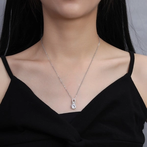 Elegant 2 carat round cubic zirconia pendant necklace shown on model neck profile