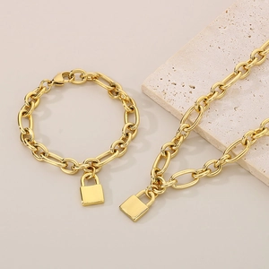Chunky gold stainless steel oval chain necklace and bracelet set with lock pendant
