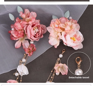 Detail of pink silk flower hairpin with detachable golden tassel and pearls for Hanfu