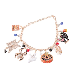 Halloween charm bracelet with pumpkin, ghost, and spider pendants on a golden chain