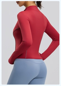 Slim fit red yoga jacket with reflective grey stripe detailing and stand collar