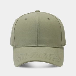 Detailed close-up of a premium olive green cotton twill baseball cap with curved brim