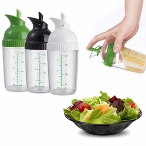 Three colors of 200ml squeeze sauce bottles with measurements for oil and vinegar