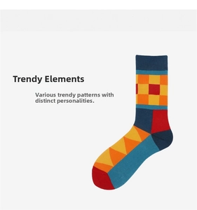 Artistic mid-calf socks with vibrant geometric patterns and ribbed cuff detail