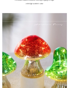 Close-up of glowing mushroom night lights in red and green for desktop holiday decor