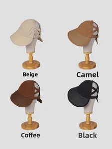 Detail of four breathable cotton sun hats showing wide brims and high ponytail back straps