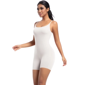 Close-up of white high-elasticity yoga bodysuit with thin straps and slimming fit