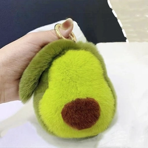 Cute plush avocado keychain made of real rabbit fur with a gold metal ring for bags