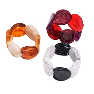 Retro acrylic marbled bangles in amber, red, and black-white geometric patterns