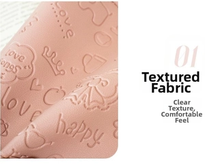 Close-up of pink embossed fabric with crown patterns for fashion crossbody bag
