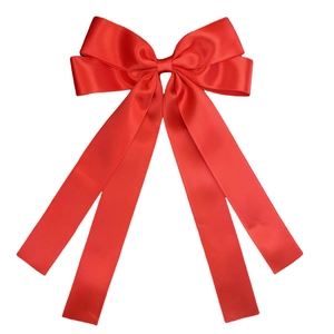 Detail shot of the glossy red satin double-layered bow hairclip with flowing long ribbons