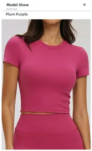 Detail of plum purple athletic crop top and leggings with ribbed seamless texture
