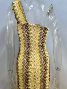 Detail of colorful wave pattern knit dress with back zipper and one-shoulder cut