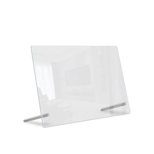 Macro shot of a transparent acrylic weekly planner board with silver metal stand supports