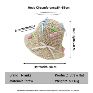 Beige straw sun hat with cute bow and cherry pendant, measuring 38cm width and 8cm brim