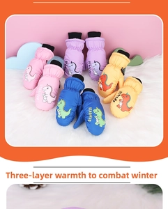 Waterproof cartoon dinosaur ski mittens for kids featuring windproof elastic wrist cuffs